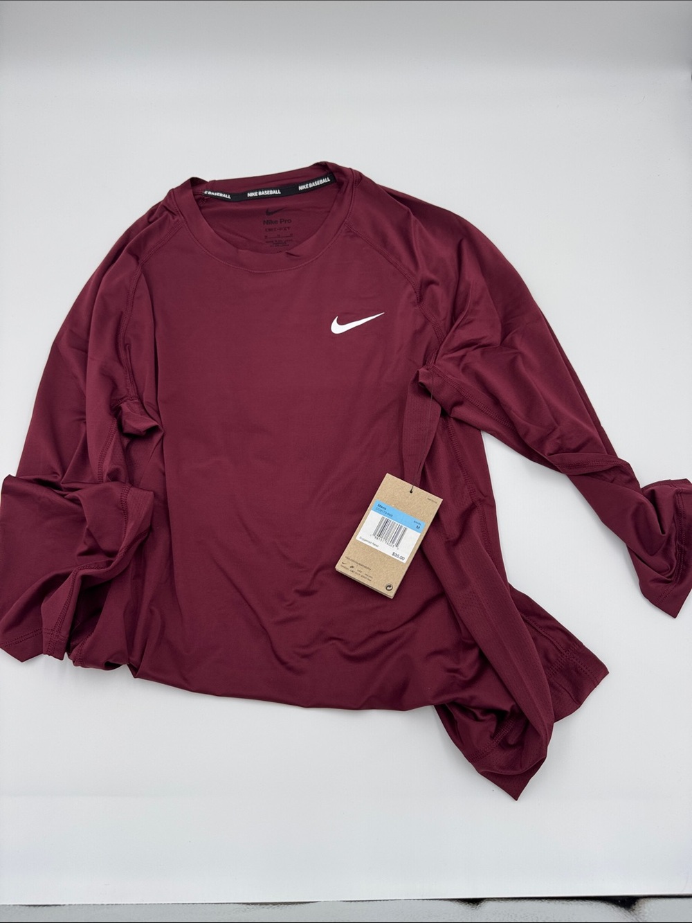 Nike Baseball Maroon Long Sleeve Performance Top with White Swoosh